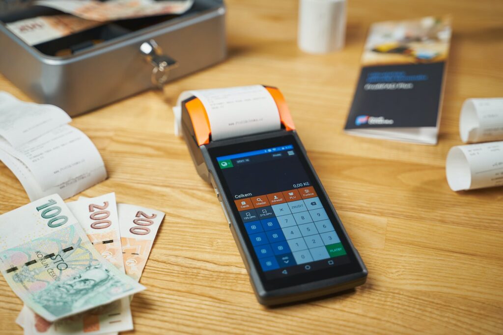 terminal and receipts on a desk