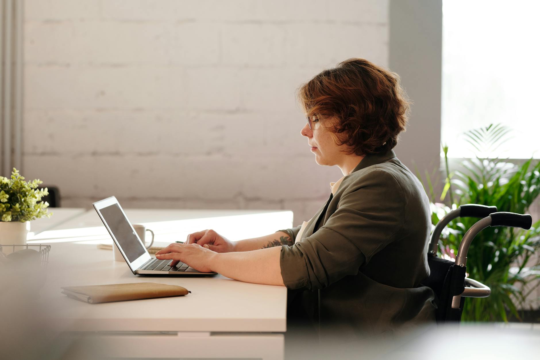 woman using laptop looking for online short term loans