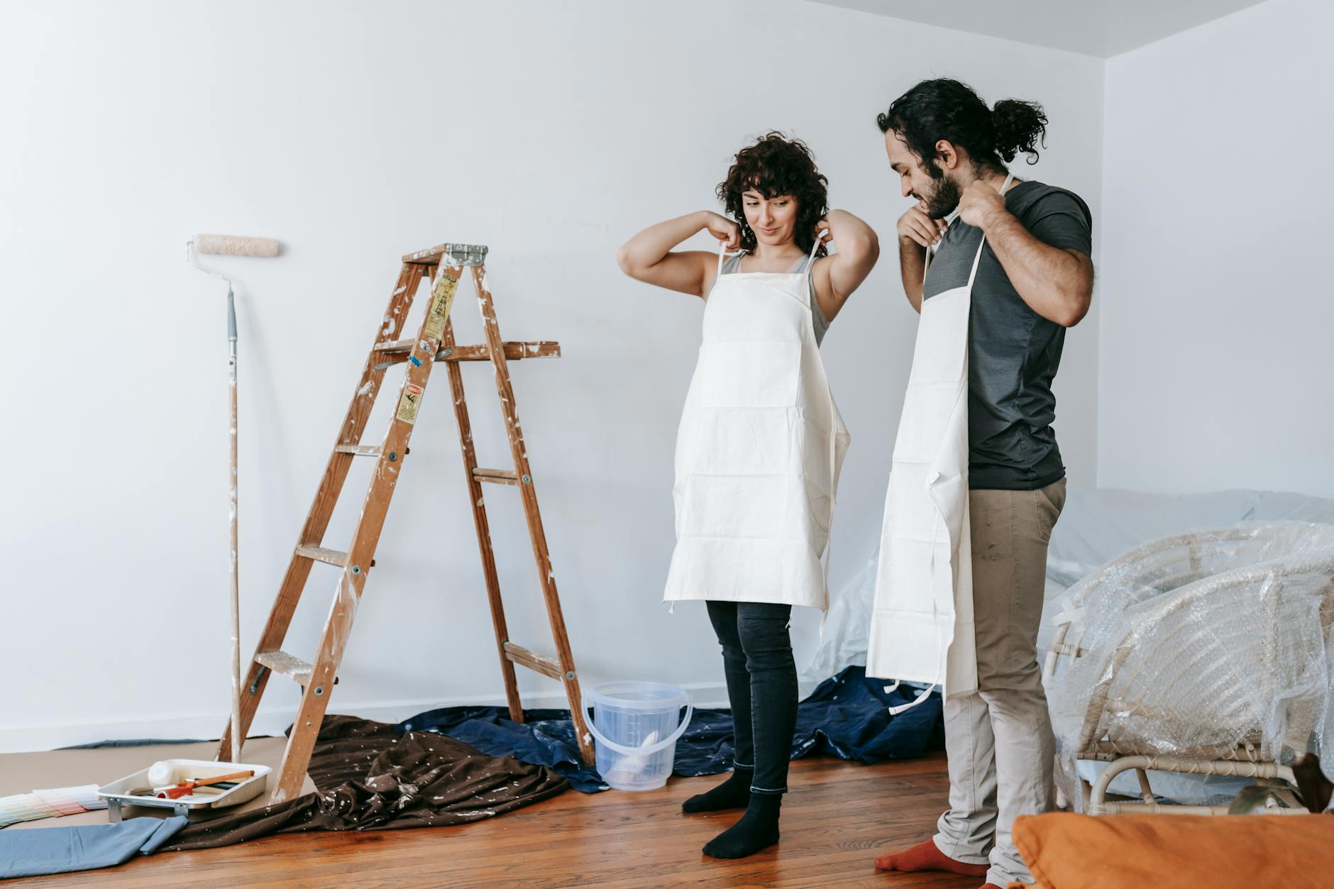 couple putting on their work clothes